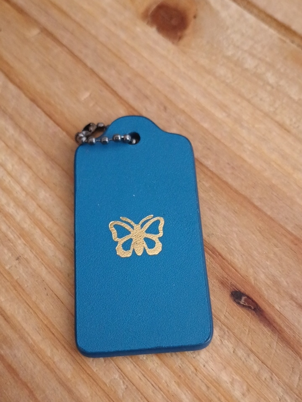 * Coach Blue Leather Key Tag with Embossed Logo & Butterfly